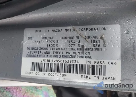 2012 Mazda Mazda3 I Grand Touring z USA, uszkodzony, nr VIN JM1BL1W85C1639234